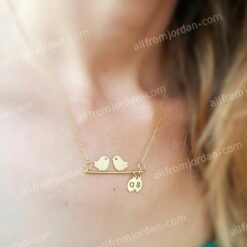 Necklace with lovebirds and two custom made initials.