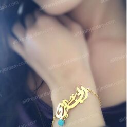 Bracelet with turquoise pendant and custom made name.