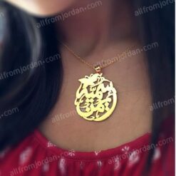 Necklace with round pendant, small inset butterfly and two custom made names.