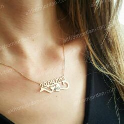 "My Special Day" necklace with custom made date and a small heart.