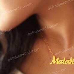 Gold or silver plated necklace with custom made name in Arabic or English and a small heart at the end.